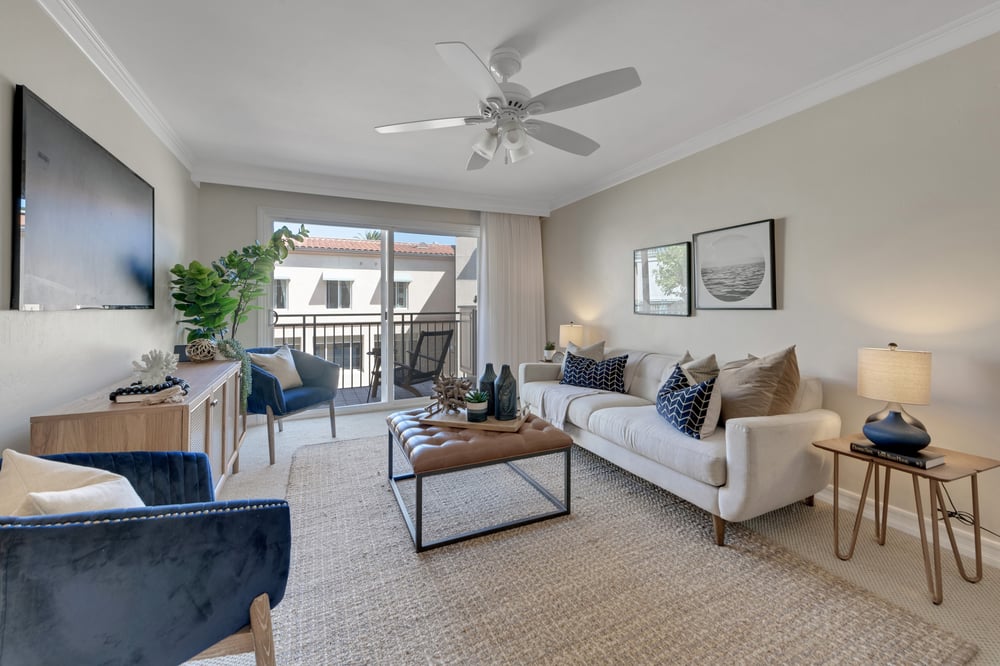 Living area with television, couch, and coffee table